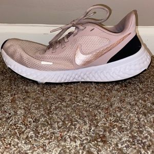 Pink Nike Revolution 5 running shoes